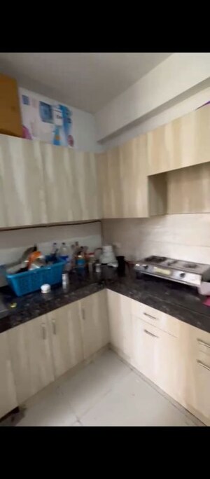 Kitchen in 3 BHK Apartment at Ajnara Le Garden, Sector 16b Greater Noida – for Rent