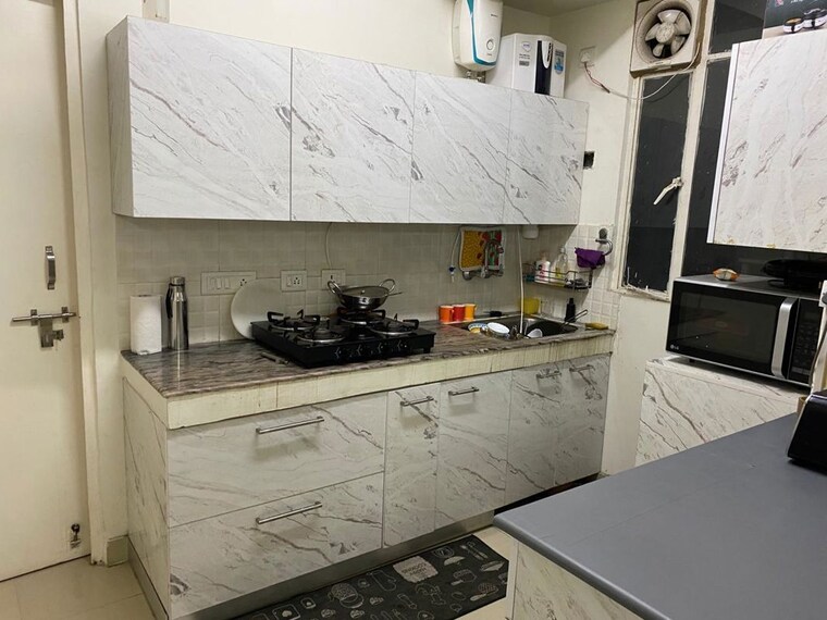 Kitchen, pivotal-riddhi-siddhi 2 Bedroom 600 Sq.Ft. Apartment In Sector 99 Gurgaon 10526232