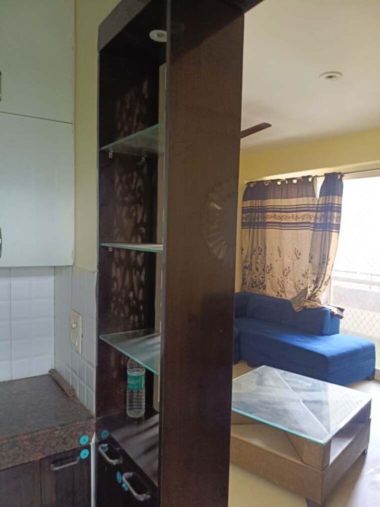 Living Room, wall-rock-aishwaryam 2.5 Bedroom 1190 Sq.Ft. Apartment In Sector 16c Greater Noida Greater Noida 10526273