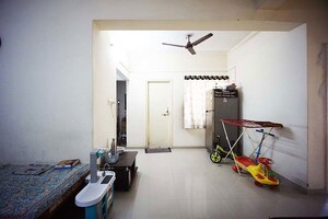 Living Room in 2 BHK Apartment at Maninagar – for Sale