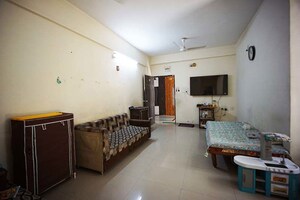 Living Room in 2 BHK Apartment at Maninagar – for Sale