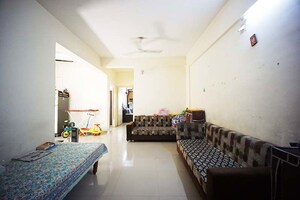 Living Room in 2 BHK Apartment at Maninagar – for Sale
