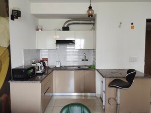 Kitchen in 1 BHK Apartment at Urbtech NPX, Sector 153 – for Sale