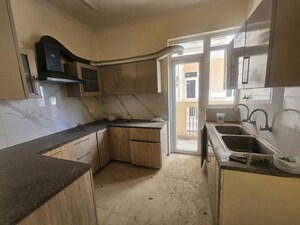 Kitchen in 3 BHK Apartment at Affinity Greens, International Airport Road – for Rent