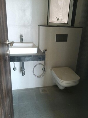 Bathroom in 2 BHK Apartment at Bhartiya City Nikoo Homes 4, Thanisandra Main Road – for Rent