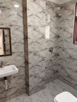 Bathroom in 1 BHK Builder Floor at Freedom Fighters Enclave – for Rent