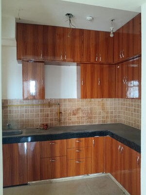 Kitchen in 2.5 BHK Apartment at Mahagun My Woods, Sector 16c Greater Noida – for Rent