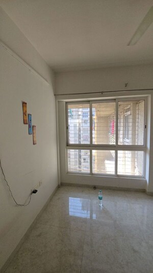Room in 1 BHK Apartment at Lodha Quality Home Tower 2, Majiwada – for Rent