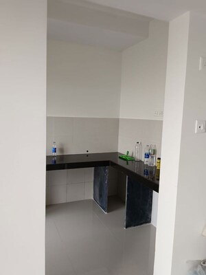 Kitchen in 1 BHK Apartment at Lodha Quality Home Tower 2, Majiwada – for Rent
