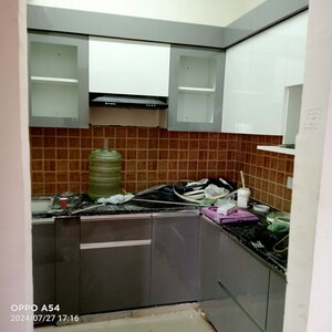 Kitchen in 2 BHK Apartment at Mahagun Mywoods, Sector 16c Greater Noida – for Rent