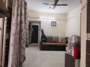 Living Room in 1 BHK Apartment at Pimple Nilakh – for Sale