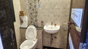 Bathroom in 2 BHK Apartment at Harasiddh Viraaj, Malad East – for Rent