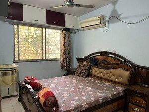 Bedroom in 1 BHK Apartment at Kshitij CHS, Yerawada – for Rent