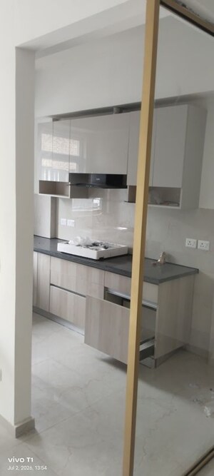 Kitchen in 3.5 BHK Builder Floor at Smart World Orchard, Sector 61 – for Rent