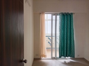 Room in 2.5 BHK Apartment at Mahagun My Woods, Sector 16c Greater Noida – for Rent