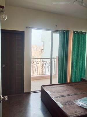 Bedroom in 2.5 BHK Apartment at Mahagun My Woods, Sector 16c Greater Noida – for Rent