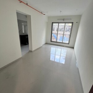 Living Room in 1 BHK Apartment at Deraiya Classico, Kurla East – for Rent