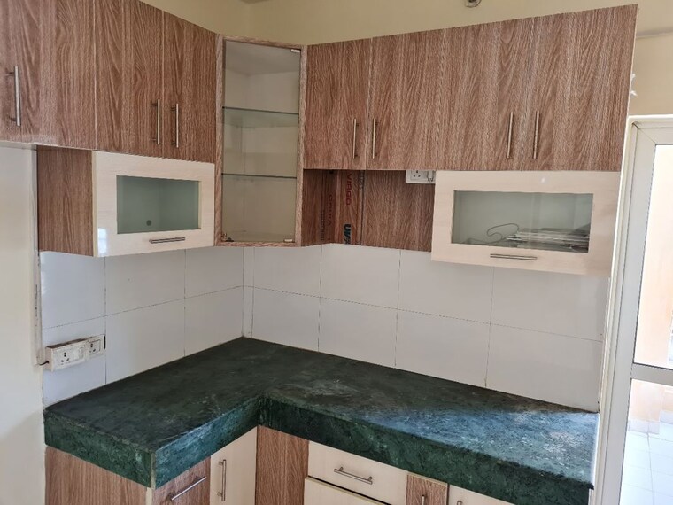 Kitchen, paras-tierea 2 Bedroom 1070 Sq.Ft. Apartment In Sector 137 Noida 10526969