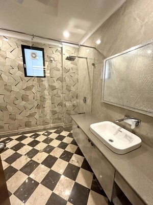 Bathroom in 4 BHK Builder Floor at Palam Vihar Residents Association, Palam Vihar – for Rent