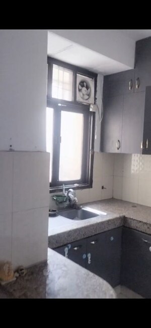 Kitchen in 2.5 BHK Apartment at SRS Royal Hills, Sector 87 – for Rent