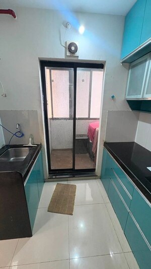 Kitchen in 2 BHK Apartment at Shapoorji Pallonji Joyville Hinjewadi, Hinjewadi – for Rent