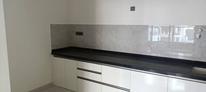 Kitchen in 3 BHK Apartment at Nirman Astropolis, Tathawade – for Rent