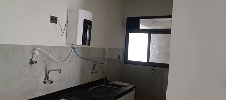 Kitchen, nirman-astropolis 3 Bedroom 1155 Sq.Ft. Apartment In Tathawade Pune 10527179