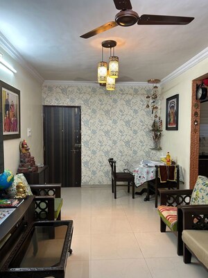 Living Room in 2 BHK Apartment at Dosti Group Maitri Gardens, Oswal Park – for Sale