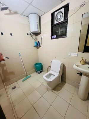 Bathroom in 2.5 BHK Apartment at Unnati Fortune The Aranya, Sector 119 – for Rent