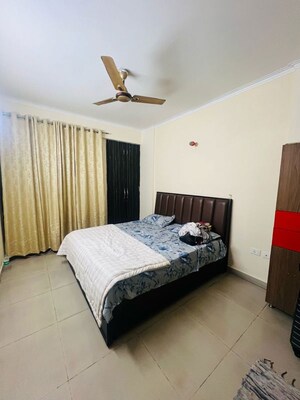 Bedroom in 2.5 BHK Apartment at Unnati Fortune The Aranya, Sector 119 – for Rent