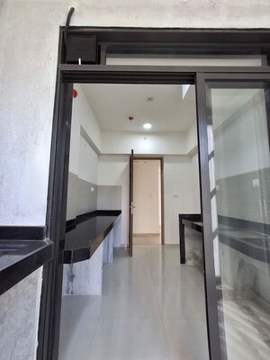 Kitchen in 3 BHK Apartment at Lodha Woods, Kandivali East – for Sale