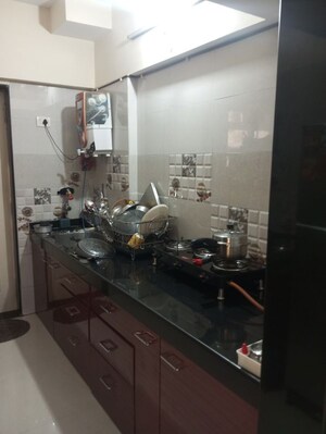 Kitchen in 1 BHK Apartment at Cosmos Empress Park, Ghodbunder Road – for Rent