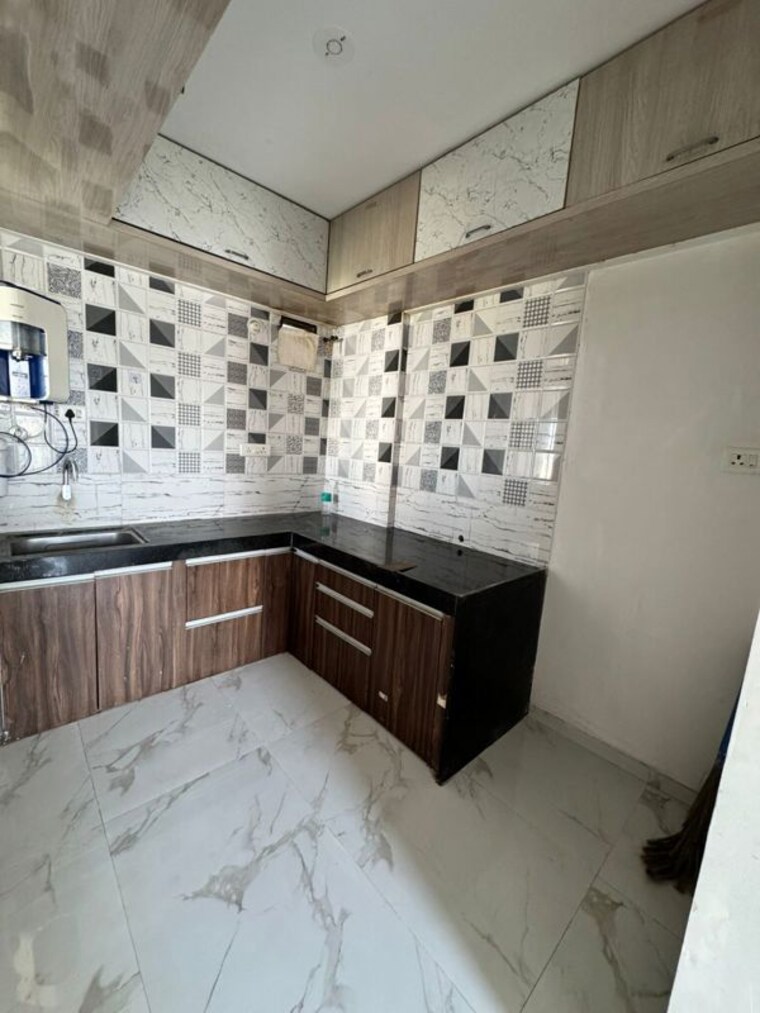 Kitchen, swapnpurti-apartment-lohegaon 2 Bedroom 760 Sq.Ft. Apartment In Lohgaon Pune 10527221
