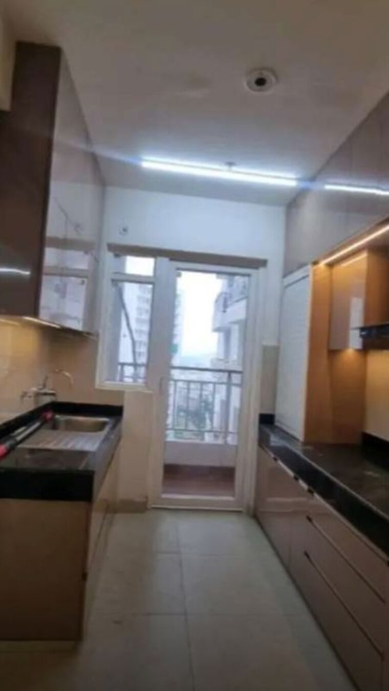 Kitchen, ansal-celebrity-meadows 3 Bedroom 1800 Sq.Ft. Apartment In Sushant Golf City Lucknow 10527495