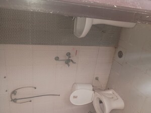 Bathroom in 2 BHK Apartment at Javin Raj Empire, Raj Nagar Extension – for Sale