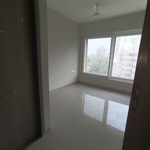 Room in 2 BHK Apartment at Pratham 5TH Element, Andheri West – for Rent