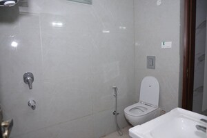 Bathroom in 4 BHK Apartment at Maharishi Dayanand CGHS, Vasant Kunj – for Rent