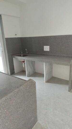 Kitchen in 2 BHK Apartment at Dosti West County, Balkum Pada – for Rent