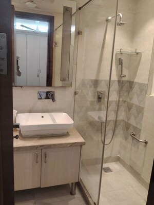 Bathroom in 3 BHK Builder Floor at Safdarjung Development Area – for Rent