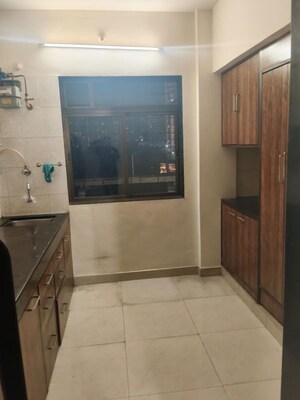 Kitchen in 1 BHK Apartment at Highland Residency CHSL, Balkum Pada – for Rent