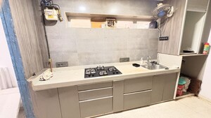 Kitchen in 2 BHK Apartment at Oshiwara Mhada, Andheri West – for Rent