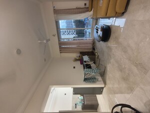Living Room in 1 BHK Apartment at Crescent Silverwoods, Powai – for Rent