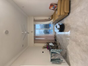 Living Room in 1 BHK Apartment at Crescent Silverwoods, Powai – for Rent