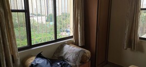 Room in 1 BHK Apartment at Dosti Group Maitri Gardens, Oswal Park – for Rent