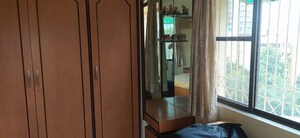 Bedroom in 1 BHK Apartment at Dosti Group Maitri Gardens, Oswal Park – for Rent