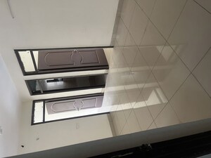 Room in 2 BHK Apartment at Charms Castle, Raj Nagar Extension – for Sale