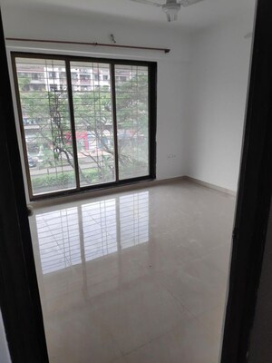 Room in 2 BHK Apartment at Shree Krishna Paradise, Kharghar – for Rent