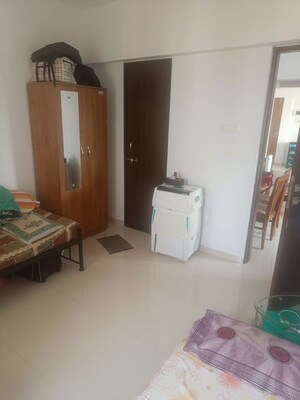 Living Room in 2 BHK Apartment at Buttepatil Gulab Shilp, Warje – for Rent
