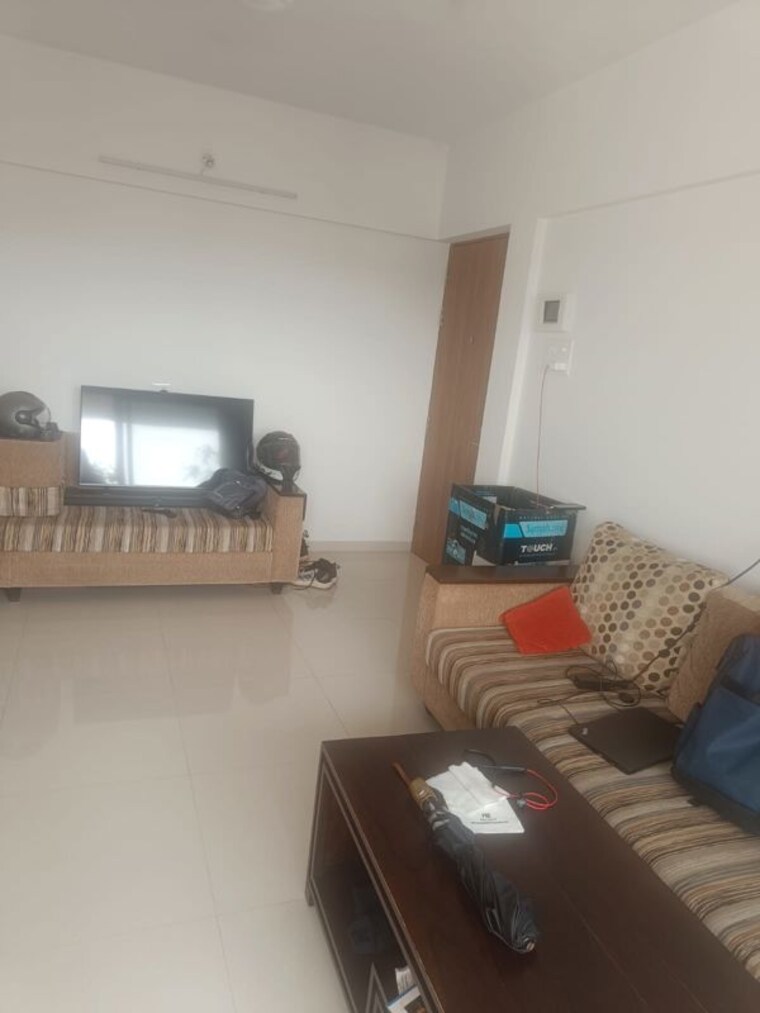 Living Room, buttepatil-gulab-shilp 2 Bedroom 870 Sq.Ft. Apartment In Warje Pune 10528291
