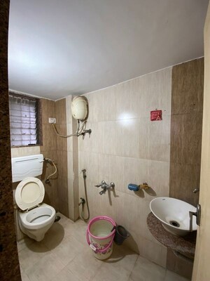 Bathroom in 2 BHK Apartment at Mohan Regency, Kalyan West – for Sale